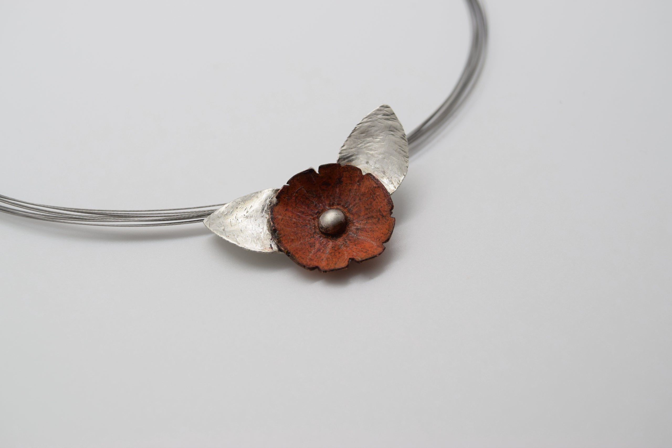Colored pencil on shop copper jewelry